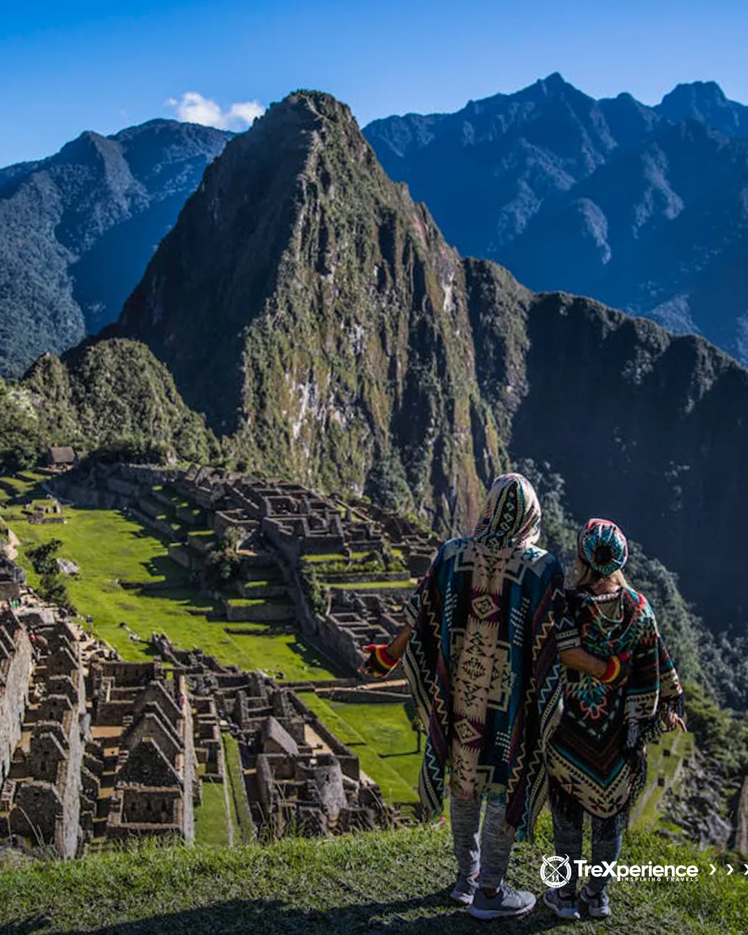 Couple looking at Machu Picchu Couple looking at Machu Picchu | TreXperience
